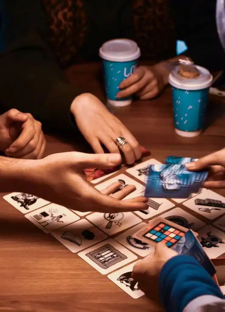 An image showcasing the hands of people in a gameplay.